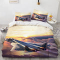 Housse de couette Avions de Combat et de Chasse, avion en vol ciel orangé coucher de soleil