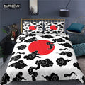 Housse de couette Soleil Levant, grand soleil rouge et nuages noirs sur fond blanc